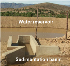 Figure 4: Ex situ rainwater harvesting with small-scale water reservoir (atajado) in the Bolivian Andes with sedimentation basin at the inlet (Photo: Picht, H.J.)